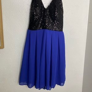 Pre-owned beautiful blue and black dress in good condition brand B. Darlin